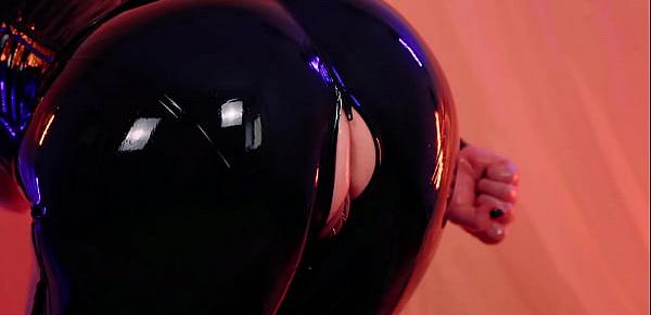trendssexy curvy MILF Arya Grander fetish model posing in latex rubber catsuit